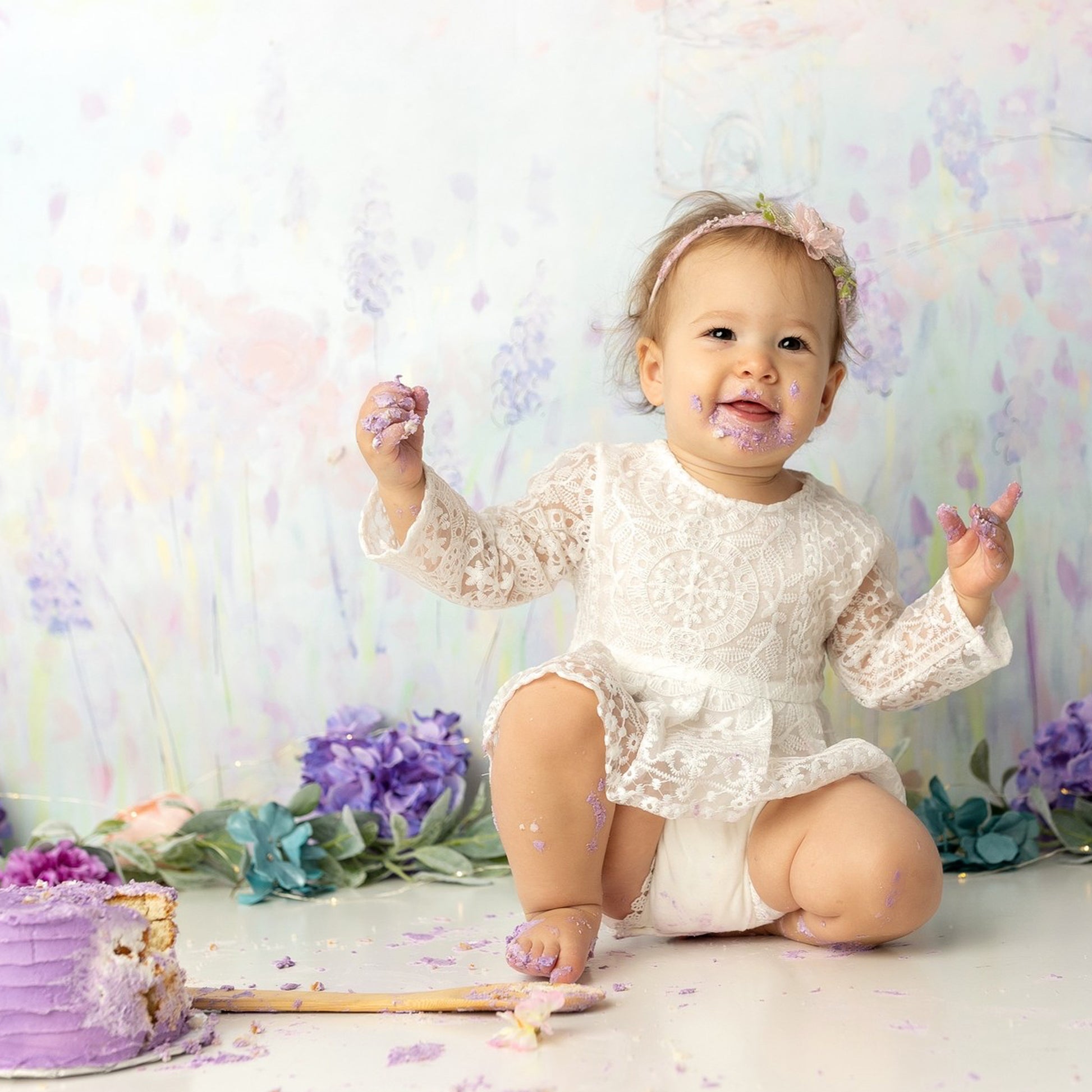 Baby girl lace gown with floral print.