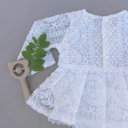 White toddler lace beach walks outfit.