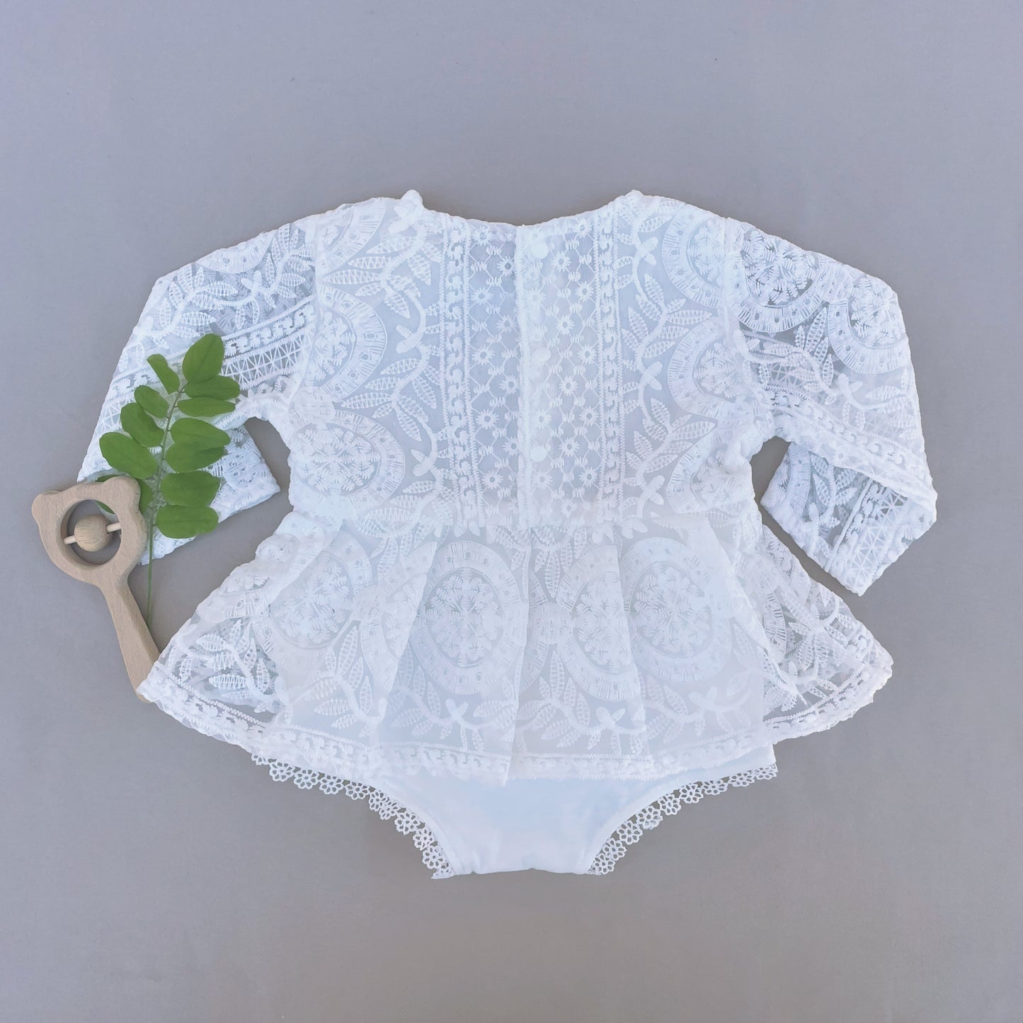  Lace newborn romper with long sleeve for special occasions.