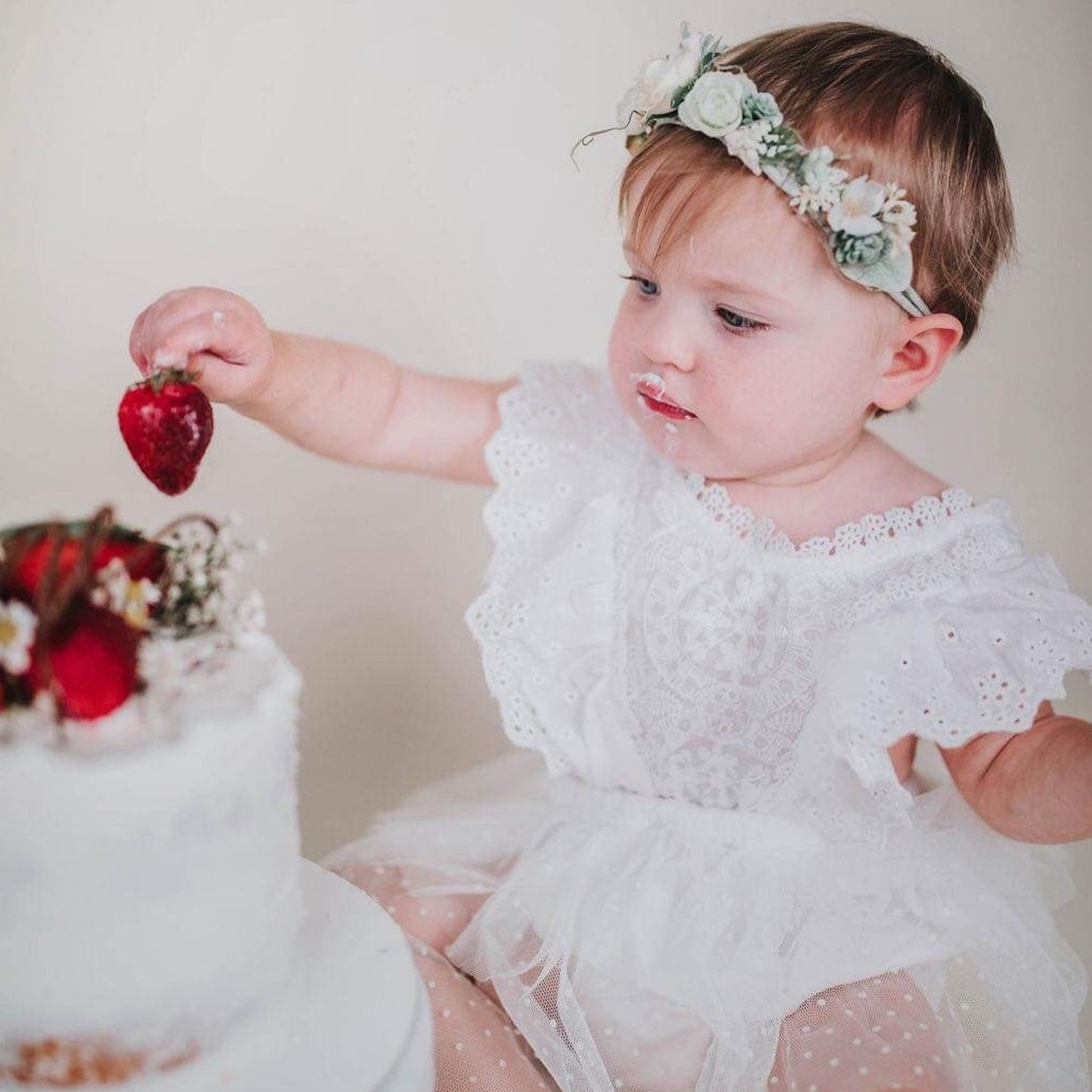 Infant girl white tulle gown.