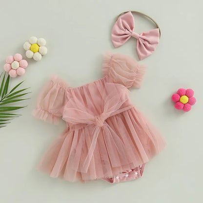 Lush tulle dress with a bow for a Newborn Photoshoot.