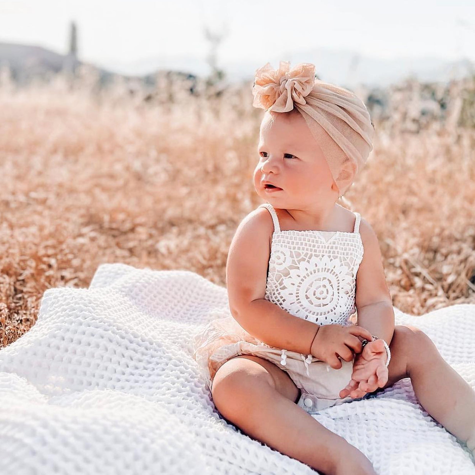 Ivory lace baby outfit for First Communion.